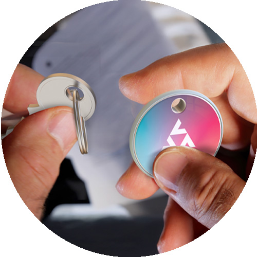 PowerTag__keyfinder_hand_features PowerTag attaches to keys to help you find them